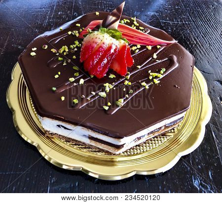 Delicious Chcocolate Cakes Covered With Sugar Icing