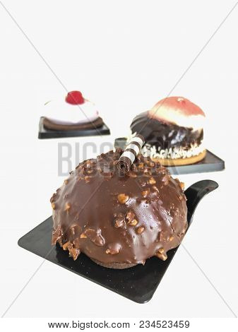 Delicious Chcocolate Cakes Covered With Sugar Icing
