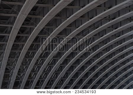 A View Of The Arch Of A Bridge Over The River Thames Showing The Construction.