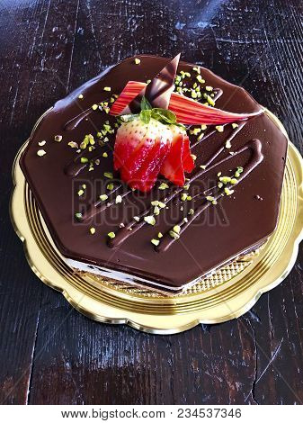 Delicious Chcocolate Cakes Covered With Sugar Icing