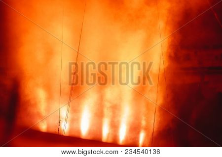 The Light Rays From The Spotlight Through The Smoke. Lighting Equipment On The Ceiling. The Stage Of