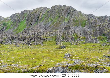Rocky Cliffs On The Coast Of The Barents Sea, Varangerhalvoya National Park, Varanger Peninsula, Fin