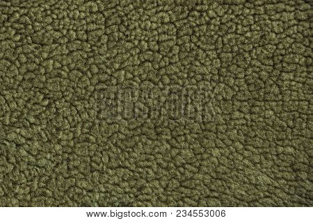 Artificial Vintage Fur. Yellow Fur Pattern Background. Macro Material.