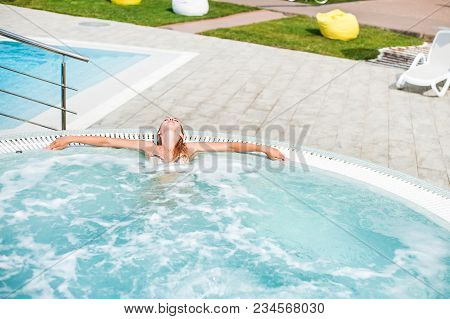 Beautiful Woman In Outdoor Hydromassage Tube