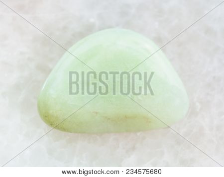 Macro Shooting Of Natural Mineral Rock Specimen - Polished Prasiolite (green Quartz) Gemstone On Whi