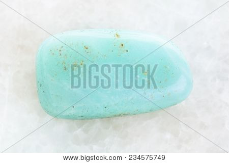 Macro Shooting Of Natural Mineral Rock Specimen - Polished Aquamarine (blue Beryl) Gemstone On White