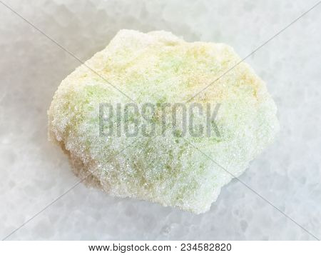 Macro Shooting Of Natural Mineral Rock Specimen - Rough Lavrovite Stone On White Marble Background F