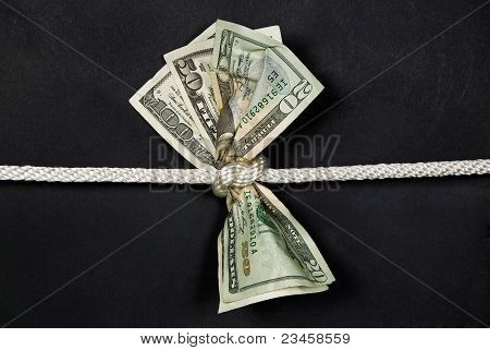 geld geknoopt met touw