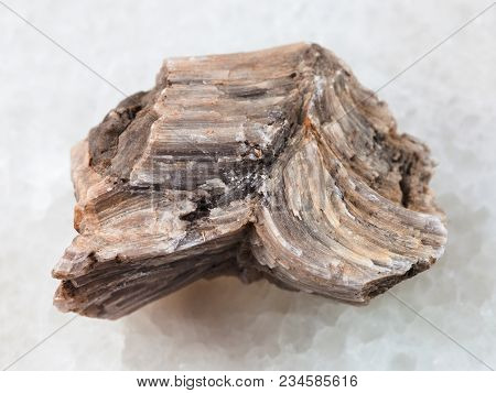 Macro Shooting Of Natural Mineral Rock Specimen - Raw Baryte Stone On White Marble Background From I
