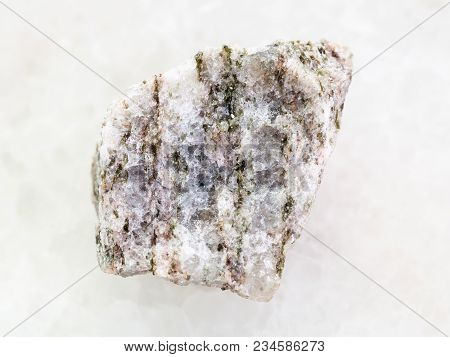 Macro Shooting Of Natural Mineral Rock Specimen - Raw Apatite ( Ore Of Phosphorus) Stone On White Ma