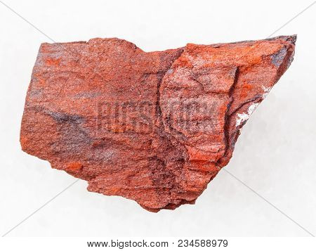 Macro Shooting Of Natural Mineral Rock Specimen - Raw Ferruginous Quartzite ( Jaspilite) Stone On Wh