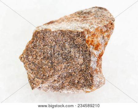 Macro Shooting Of Natural Mineral Rock Specimen - Rough Quartzite Stone On White Marble Background
