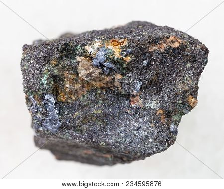 Macro Shooting Of Natural Mineral Rock Specimen - Raw Molybdenite Stone On White Marble Background F