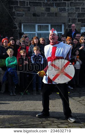 Heptonstall, Uk - March 20 2018: The Character Saint George In The Traditional Good Friday Pace Egg 