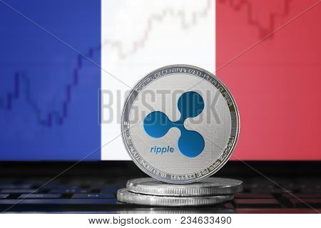 Ripple (xrp) Cryptocurrency; Physical Concept Ripple Coin On The Background Of The Flag Of France (f