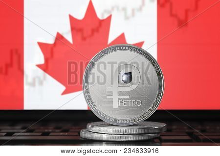 Petro (ptr) Cryptocurrency; Coin El Petro On The Background Of The Flag Of Canada; National Venezuel