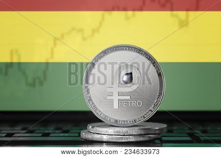 Petro (ptr) Cryptocurrency; Coin El Petro On The Background Of The Flag Of Bolivia; National Venezue