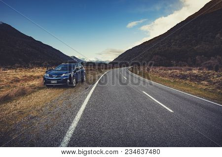 Appiring National Park Newzealand - Sep4,2015:suv Car Parking Beside Country Road In Traveling Route