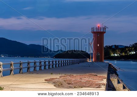 Lighthouse On The Sea Coast In Blue Hours