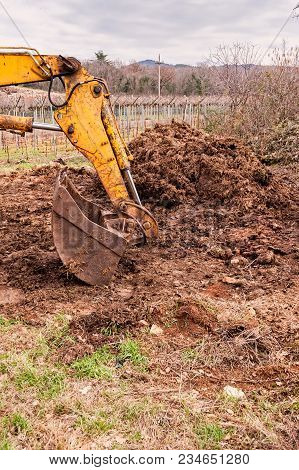 Old Digger Used To Move And Load Manure In Agriculture.