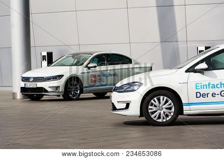 Dresden, Germany - April 2 2018: Plug-in Hybrid Electric Car Volkswagen Golf Gte Stands By Charging 