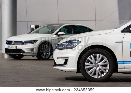 Dresden, Germany - April 2 2018: Plug-in Hybrid Electric Car Volkswagen Golf Gte Stands By Charging 