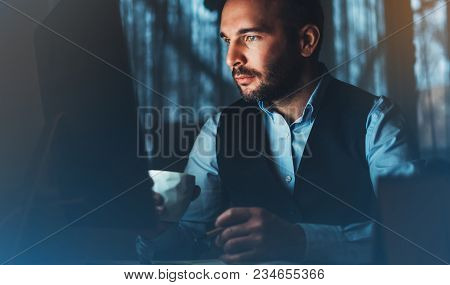 Bearded Young Businessman Working On Modern Office. Consultant Man Thinking Looking In Monitor Compu