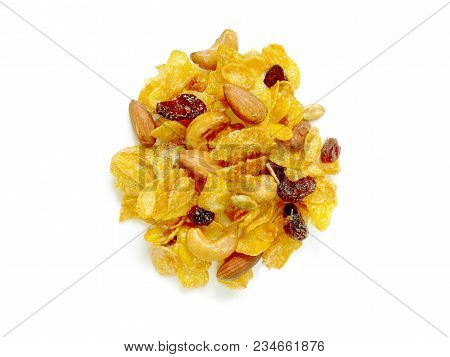 Crunchy Caramel Conflakes With Almonds, Cashew Nuts, Pumpkin Seeds And Dried Cranberries Isolated On