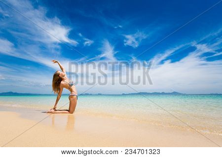 Tropical Summer Yoga Session On Beautiful Sunset Beach, Koh Kradan Island In Thailand. Vriksha Asana