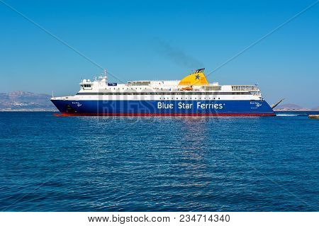 Naxos, Greece - May 23, 2017: Blue Star Ferry Boat Leaving The Port Of Naxos. Blue Star Ferries Is O