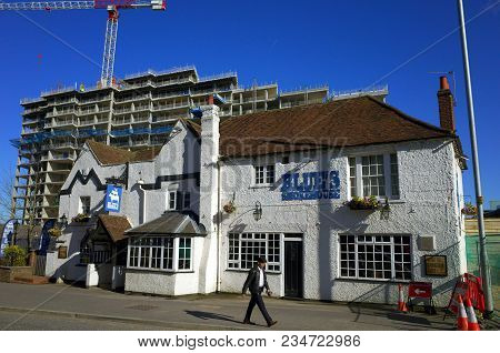 Bracknell, England - April 05, 2018: A Pedestrian Passes By The Blues Smokehouse, Formerly A Pub And