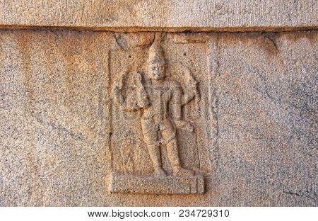 Stone Bas-reliefs On The Walls In Temples Hampi. Carving Stone Ancient Background. Carved Figures Ma