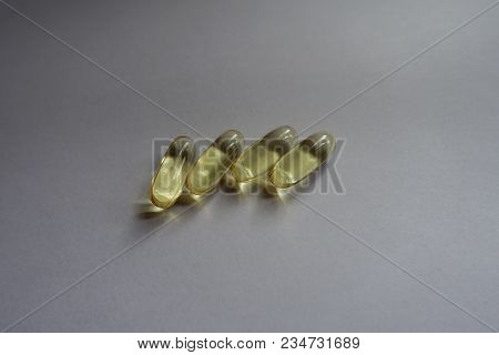 4 Big Oblong Yellow Fish Oil Softgel Capsules