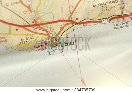 Licata. The Island Of Sicily, Italy. A Paper Map And Roads On The Map.