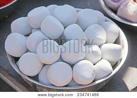 White Round Crayons For Drawing Mandalas On The Ground, India, Hampi.