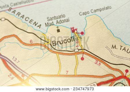 Brucoli. The Island Of Sicily, Italy. A Paper Map And Roads On The Map.