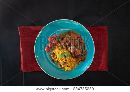 Kefta Tagine Moroccan Meatballs Served With Semolina and Vegetables 