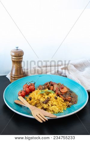 Kefta Tagine Moroccan Meatballs Served With Semolina and Vegetables 
