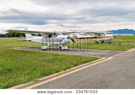 Small Private Airplane Parked At A Small Airport.