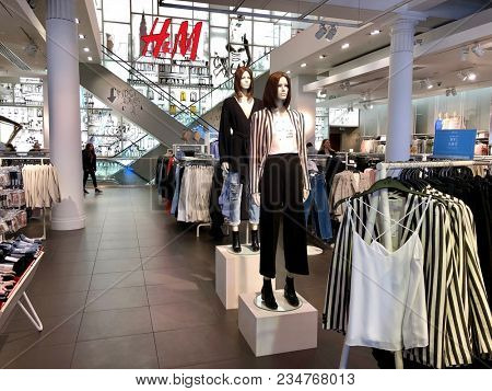 LONDON - APRIL 5, 2018: Clothes mannequins display the latest fashion trends on sale at H&M on Regent Street in London, UK.