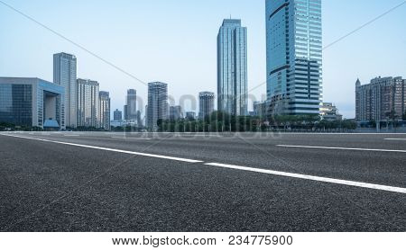 empty urban road with city skyline on background?tianjin,China,Asia.