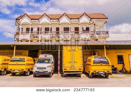 Phuket, Thailand - Dec 12, 2016: Dhl Courier Pick-up Cars Parked At A Dhl Office Shipment Facility I