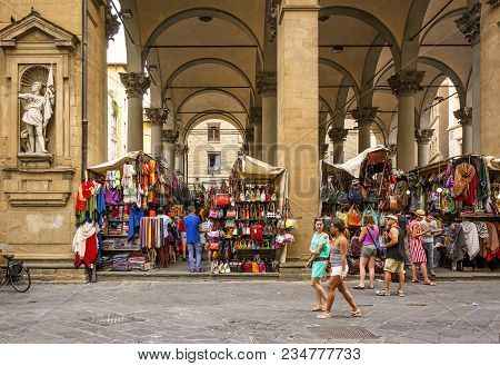 Florence, Italy, June 2015: Tourists And Florentines Walking And Shopping In The Historic Mercato De