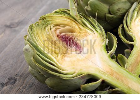Artichokes On Grey Background. Fresh Organic Artichoke Flower.
