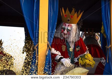 Basel, Switzerland - March 10, 2014: Dressed Up Person, A So Called Waggis At The Traditional Carniv