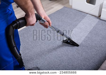 Janitor Cleaning Carpet