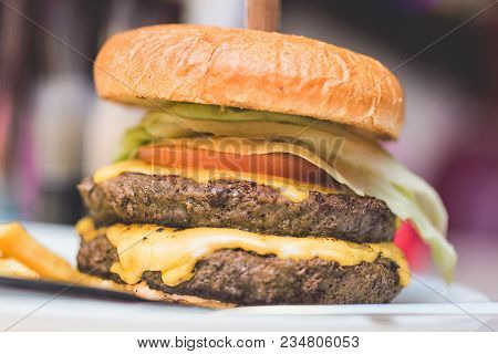 Fast Food Concept. Big Fresh Tasty Meat Burger. Close Up Image With Selective Focus.