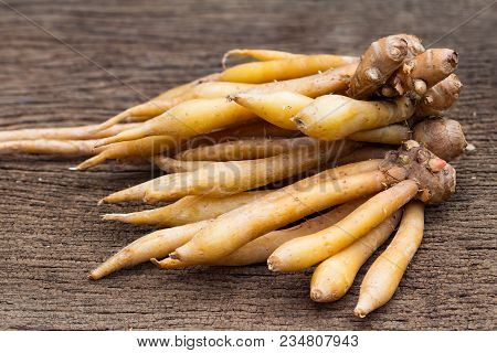 Finger Root Ingredients For Thai Cuisine And Thai Herb On Wooden Table