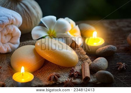 Spa Concept With Organic Soap And Burning Candles In The Dark
