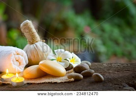 Spa Concept With Organic Soap And Burning Candles In The Dark